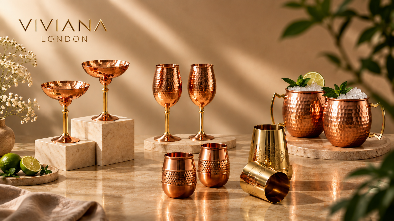 Styled luxury home bar setup featuring handcrafted hammered copper martini glasses and wine stems